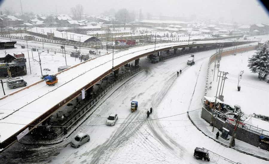 A view of Srinagar city with snow-covered street